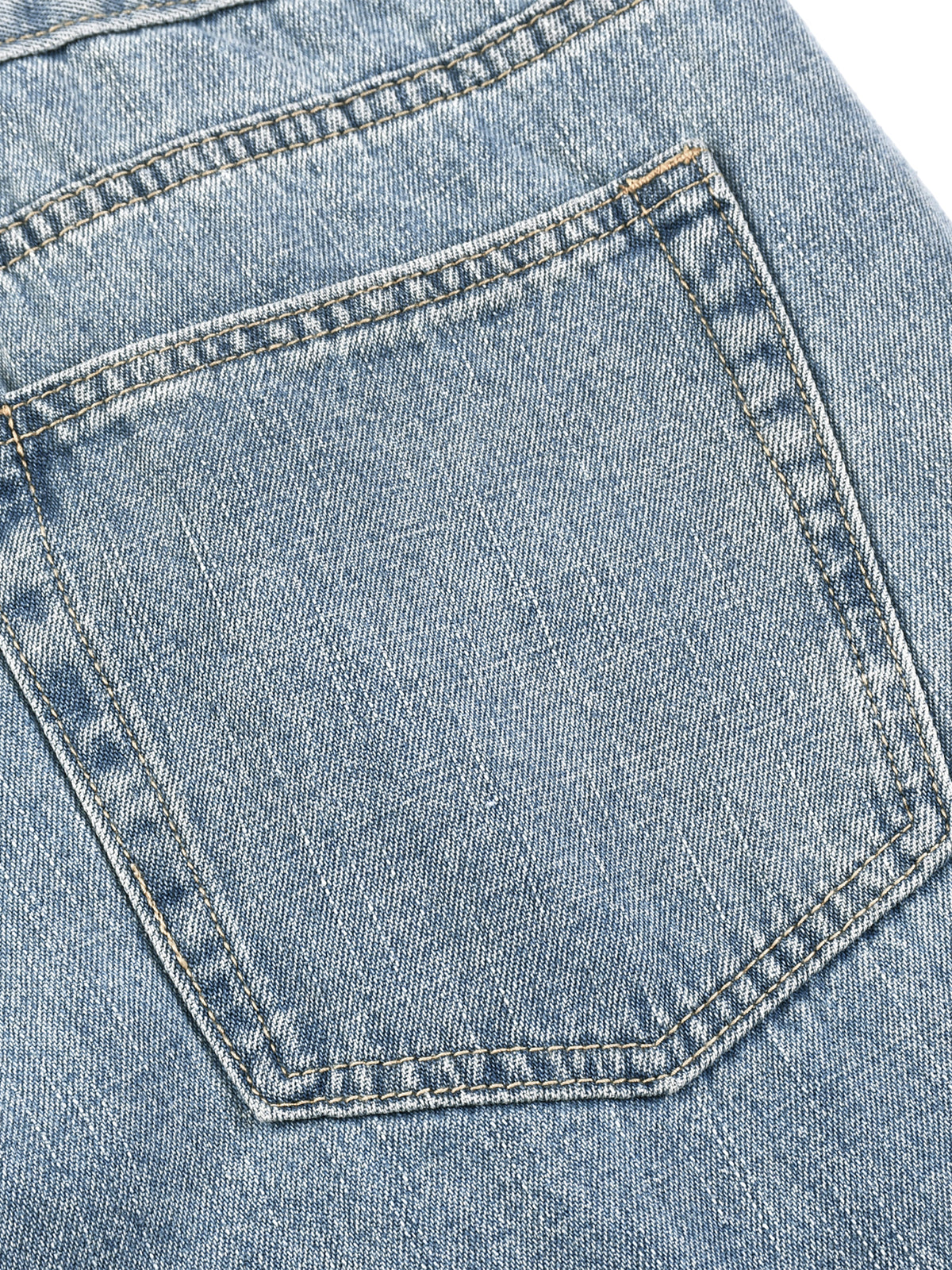 Blue vintage-wash denim jeans, up close