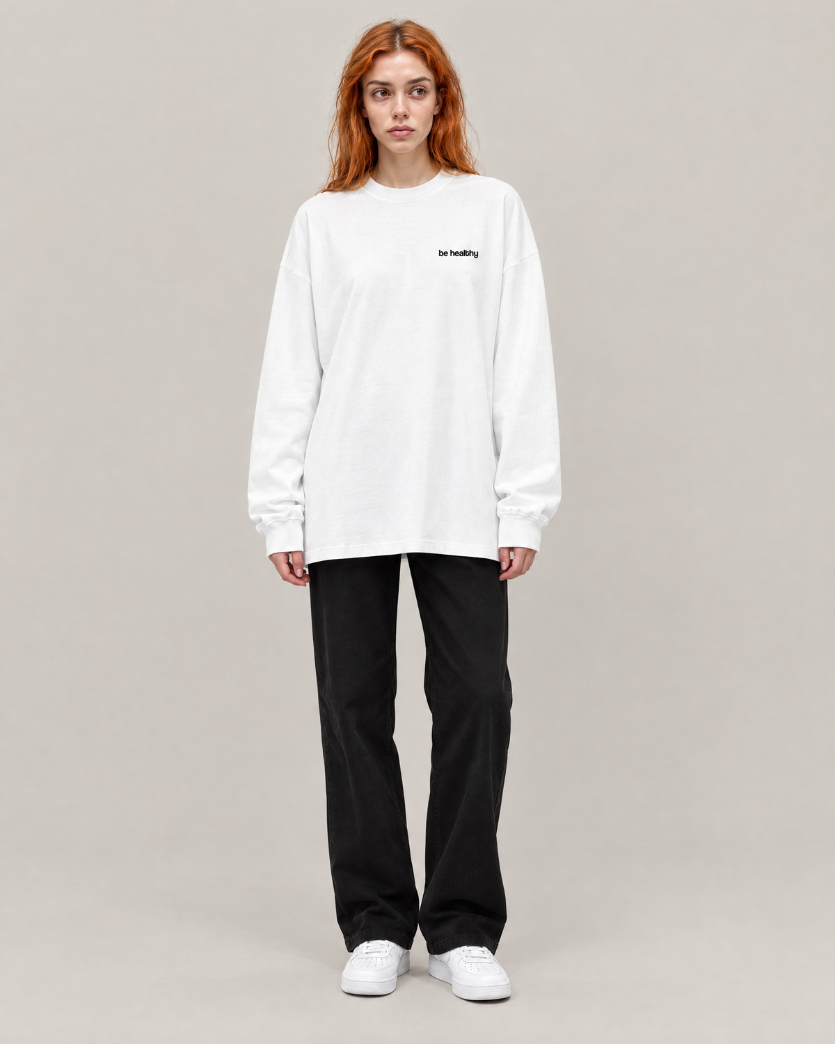 Red Light, Healthy Life oversized long sleeve tee in white, front. A is 5'7" and wears size S
