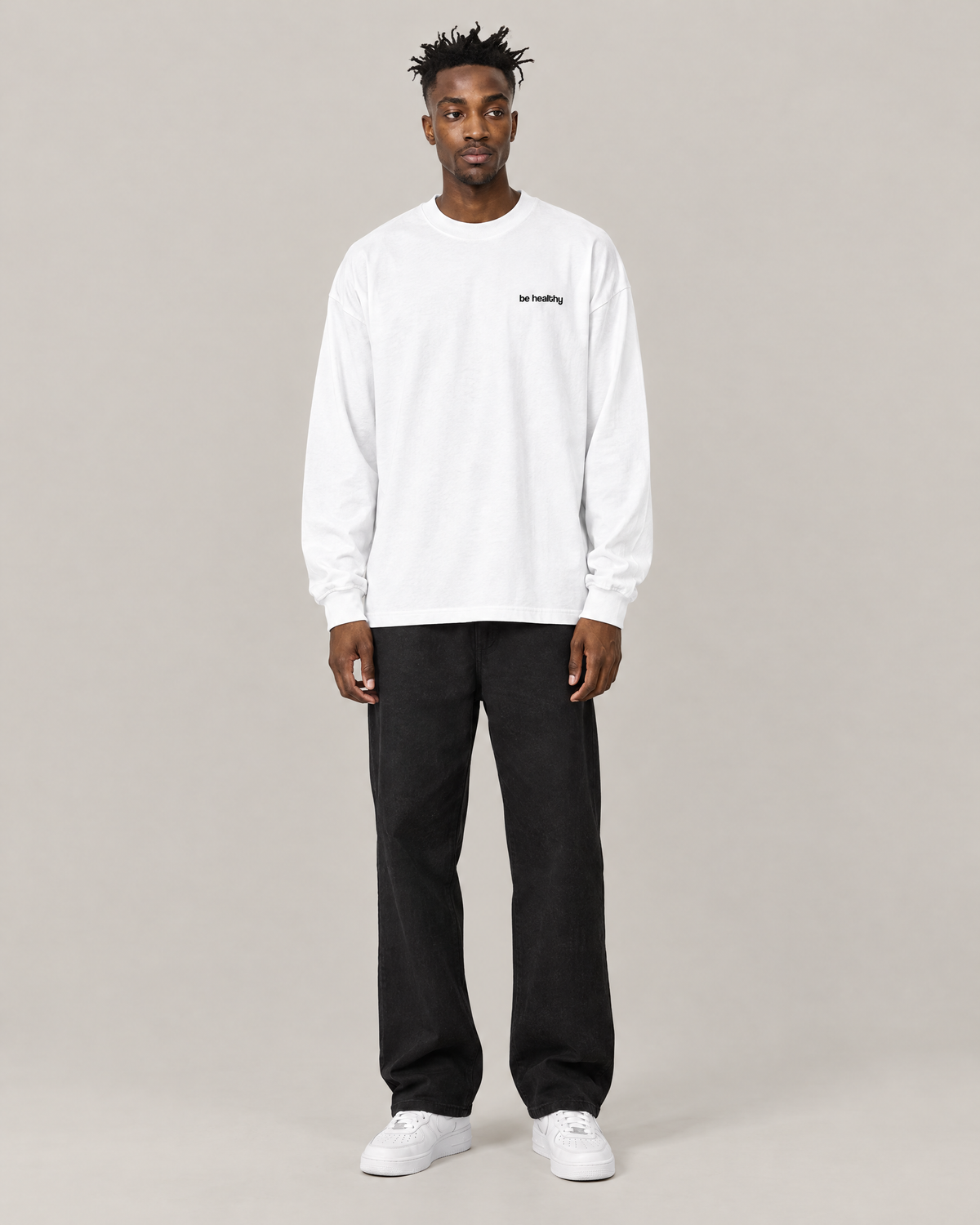 Red Light, Healthy Life oversized long sleeve tee in white, front. C is 6'2" and wears size M