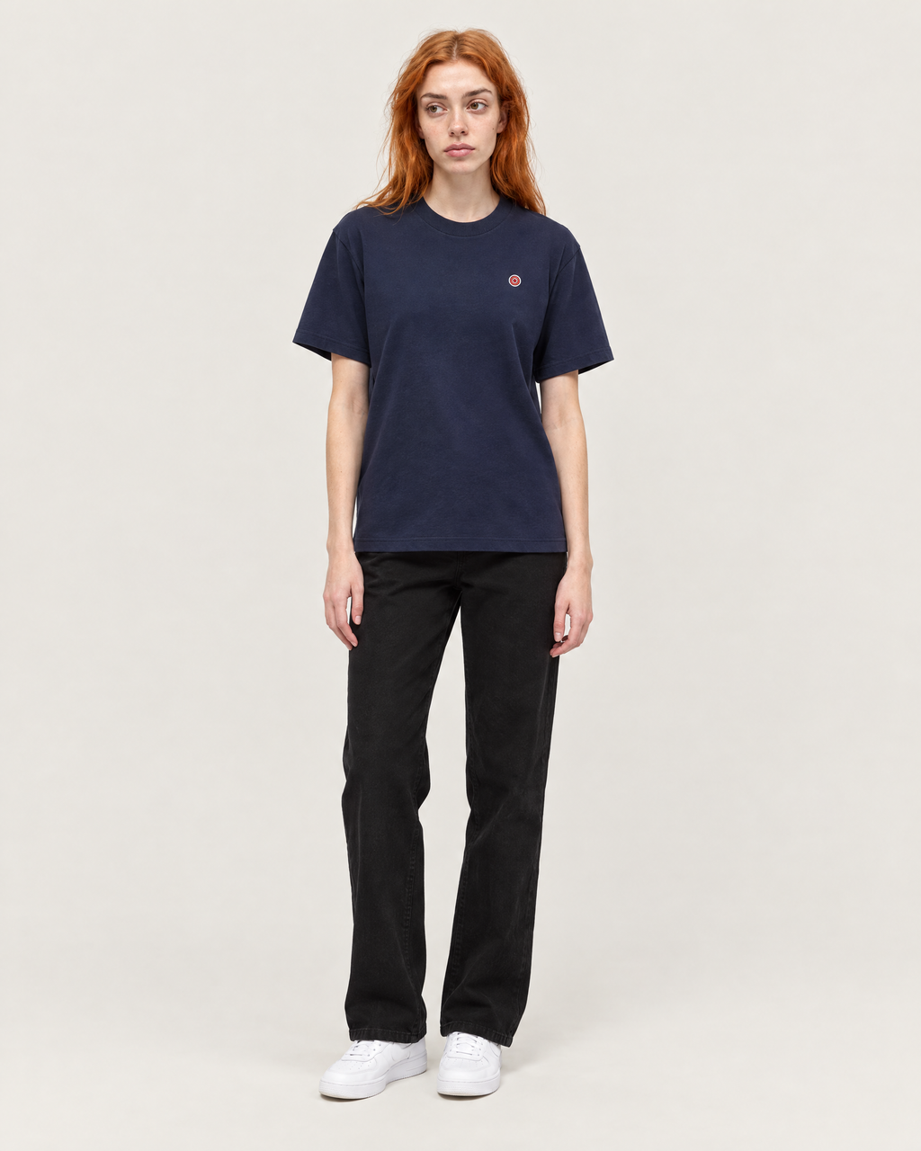 Reef's Don't Come in Gray essential tee in navy, front. A is 5'7" and wears size S