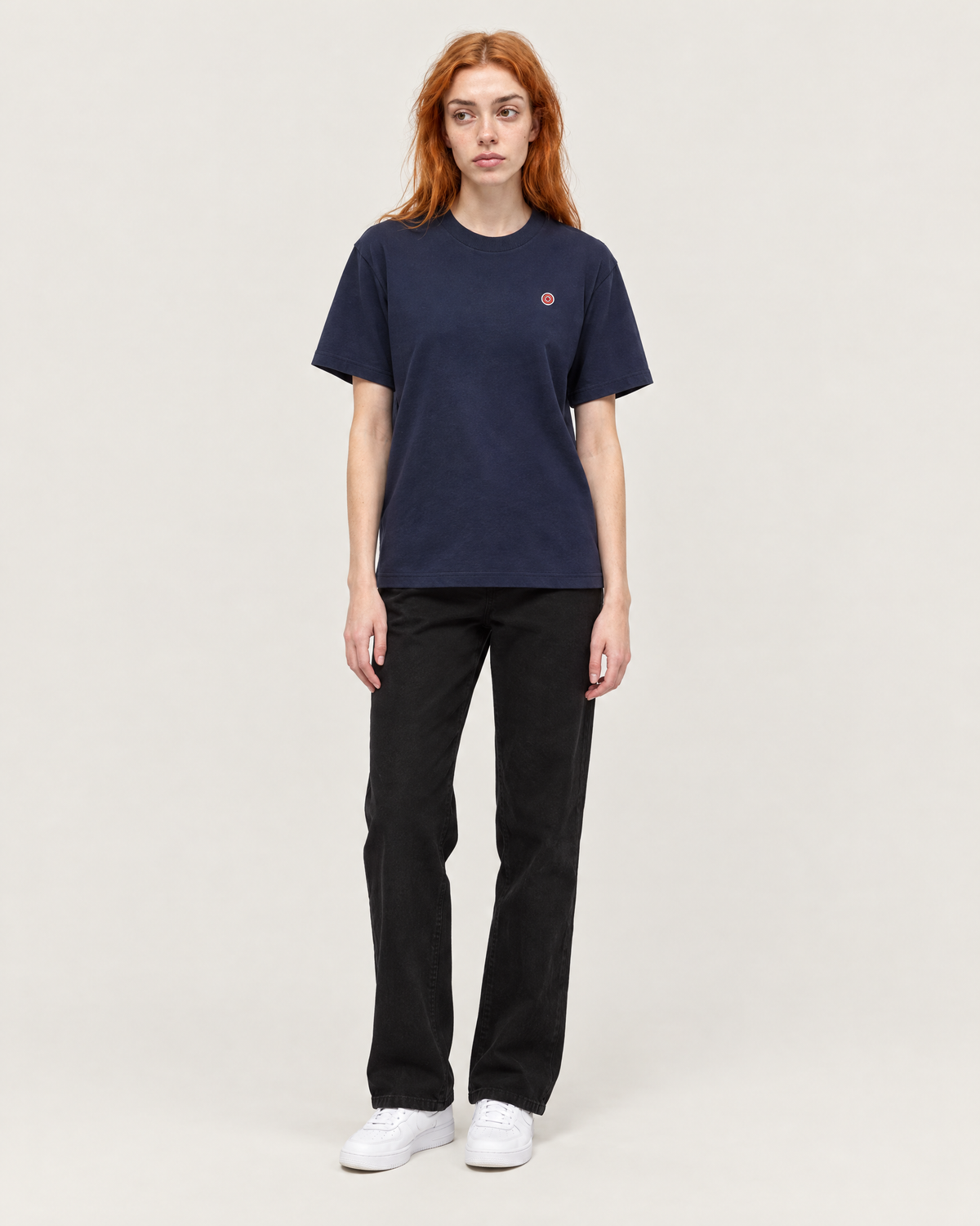 Reef's Don't Come in Gray essential tee in navy, front. A is 5'7" and wears size S